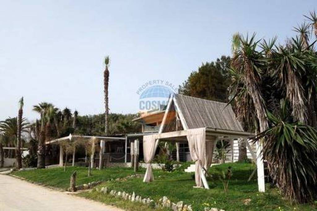 SEASIDE BEACH BAR OF 140 SQ.M- &UNFINISHED A’FLOOR OF 140 SQ.M ON THE LAND OF 8.000SQ.M IN SKALA -KEFALONIA