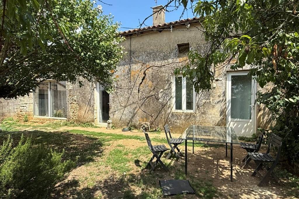Charming Country House with Garden and Garages near Nanteuil-en-Vallee