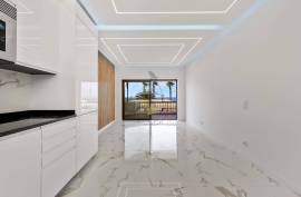 Three-Bedroom Seafront Apartment on Quarteira’s Waterfront – Prime Beachfront Location