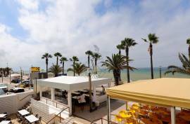 Three-Bedroom Seafront Apartment on Quarteira’s Waterfront – Prime Beachfront Location