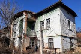 Old rural property with barn and small mill situated in a quiet village 100 km northeast from Sofia, Bulgaria