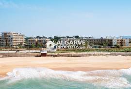 Beachfront Bliss – Elegant 1-Bedroom Apartments in Quarteira’s Most Coveted Coastal Development