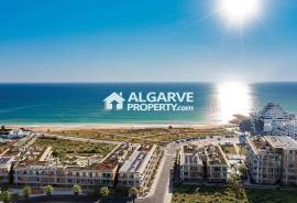 Beachfront Bliss – Elegant 1-Bedroom Apartments in Quarteira’s Most Coveted Coastal Development