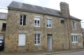 Village House with Lots of Potential