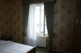 Village House with Lots of Potential