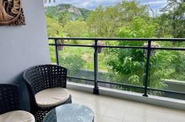 Designer Condo with outdoor jacuzzi, mountain and ocean view 2 Bed 2 Bath