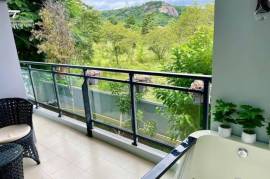 Designer Condo with outdoor jacuzzi, mountain and ocean view 2 Bed 2 Bath