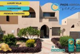Own a substantial standalone villa in the heart of Hurghada. Set within a large multi-phase development, this six-bedroom property features a 510 sqm plot, private garden, integrated technology, and an exceptional specification.