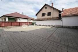 Đakovo, strict city centre - 15 m² outdoor, uncovered parking space.