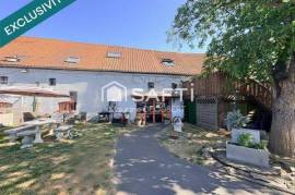 Ensemble immobilier comprenant 1 local commercial et un appartement sur un axe principal