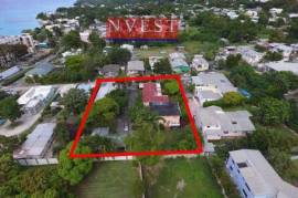 REDUCED – Development opportunity with private beach access