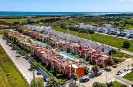 Exquiste 3 bedroom villa with garage & rooftop sea views in gated condominium with pools