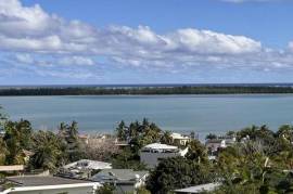 LAND WITH SUPERB VIEWS OF THE SEA, ÎLE AUX BENITIERS AND LE MORNE