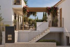 Apartamento T2 novo em Alcoitão com terraço, garagem e condomínio fechado.