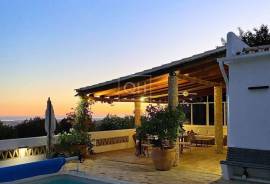 Charming 4-bedroom villa with panoramic sea views near Santa Barbara de Nexe Charming 4-bedroom villa with panoramic sea views near Santa Barbara de Nexe