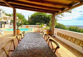 Charming 4-bedroom villa with panoramic sea views near Santa Barbara de Nexe Charming 4-bedroom villa with panoramic sea views near Santa Barbara de Nexe