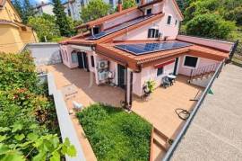 House with garage and auxiliary building