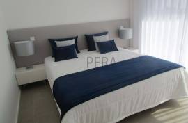 Modern 2 bedroom townhouses under construction on a golf course