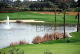 Modern 2 bedroom townhouses under construction on a golf course