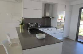 Modern 2 bedroom townhouses under construction on a golf course
