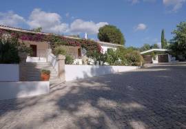 3 bedroom villa + 2 one bedroom flats for sale in Almancil with views over the countryside and the sea