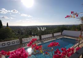 3 bedroom villa + 2 one bedroom flats for sale in Almancil with views over the countryside and the sea
