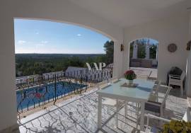 3 bedroom villa + 2 one bedroom flats for sale in Almancil with views over the countryside and the sea