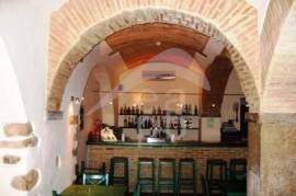 Traditional style Restaurant including two Apartments with terraces and courtyard garden.