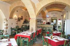 Traditional style Restaurant including two Apartments with terraces and courtyard garden.