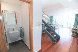 Large 2 bedroom duplex apartment with gym, garage box and swimming pool