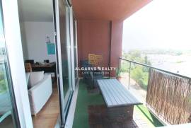 Large 2 bedroom duplex apartment with gym, garage box and swimming pool