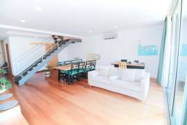 Large 2 bedroom duplex apartment with gym, garage box and swimming pool