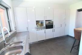 Large 2 bedroom duplex apartment with gym, garage box and swimming pool