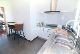 Large 2 bedroom duplex apartment with gym, garage box and swimming pool
