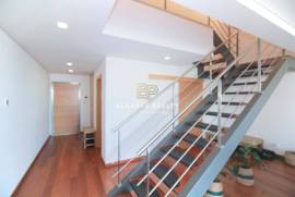 Large 2 bedroom duplex apartment with gym, garage box and swimming pool