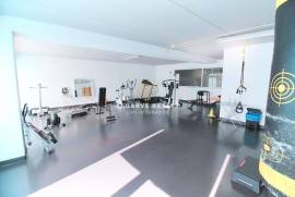 Large 2 bedroom duplex apartment with gym, garage box and swimming pool