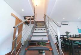 Large 2 bedroom duplex apartment with gym, garage box and swimming pool