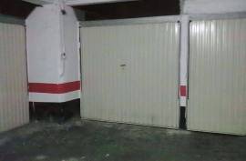 Large closed garage space with storage room and natural light. Large closed garage space with storage room and natural light.