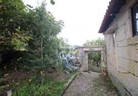 Typical Restaurant, in stone, with surrounding vineyard plantation in a village near Chaves