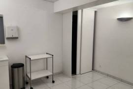 LOCAL PLUS PLACE DE PARKING en sous-sol