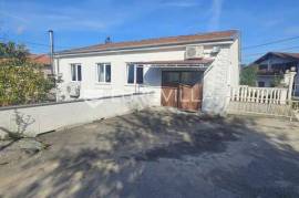 Brgud, commercial property with two garages, office spaces, and a fenced yard