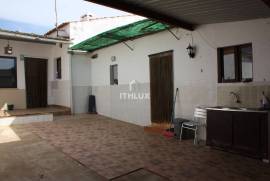 Semi-detached single storey house with backyard 