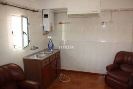Semi-detached single storey house with backyard 