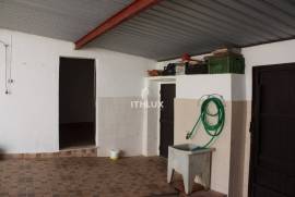 Semi-detached single storey house with backyard 
