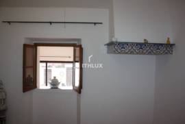 Semi-detached single storey house with backyard 
