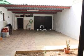 Semi-detached single storey house with backyard 