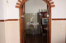 Semi-detached single storey house with backyard 