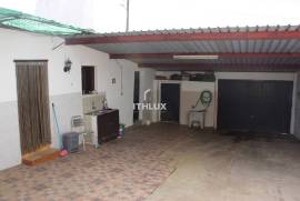 Semi-detached single storey house with backyard 