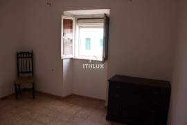 Semi-detached single storey house with backyard 