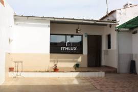 Semi-detached single storey house with backyard 
